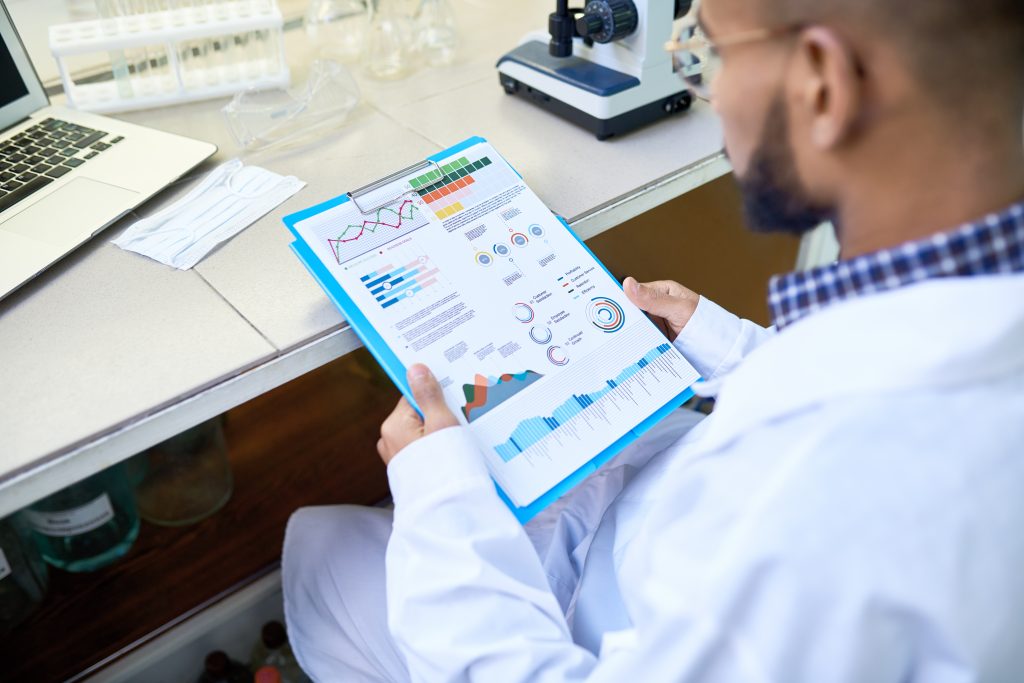 doctor looking at a health data chart